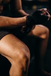 Woman in Black Leather Gloves and Black Shorts